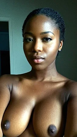 Ebony girl showing her tits